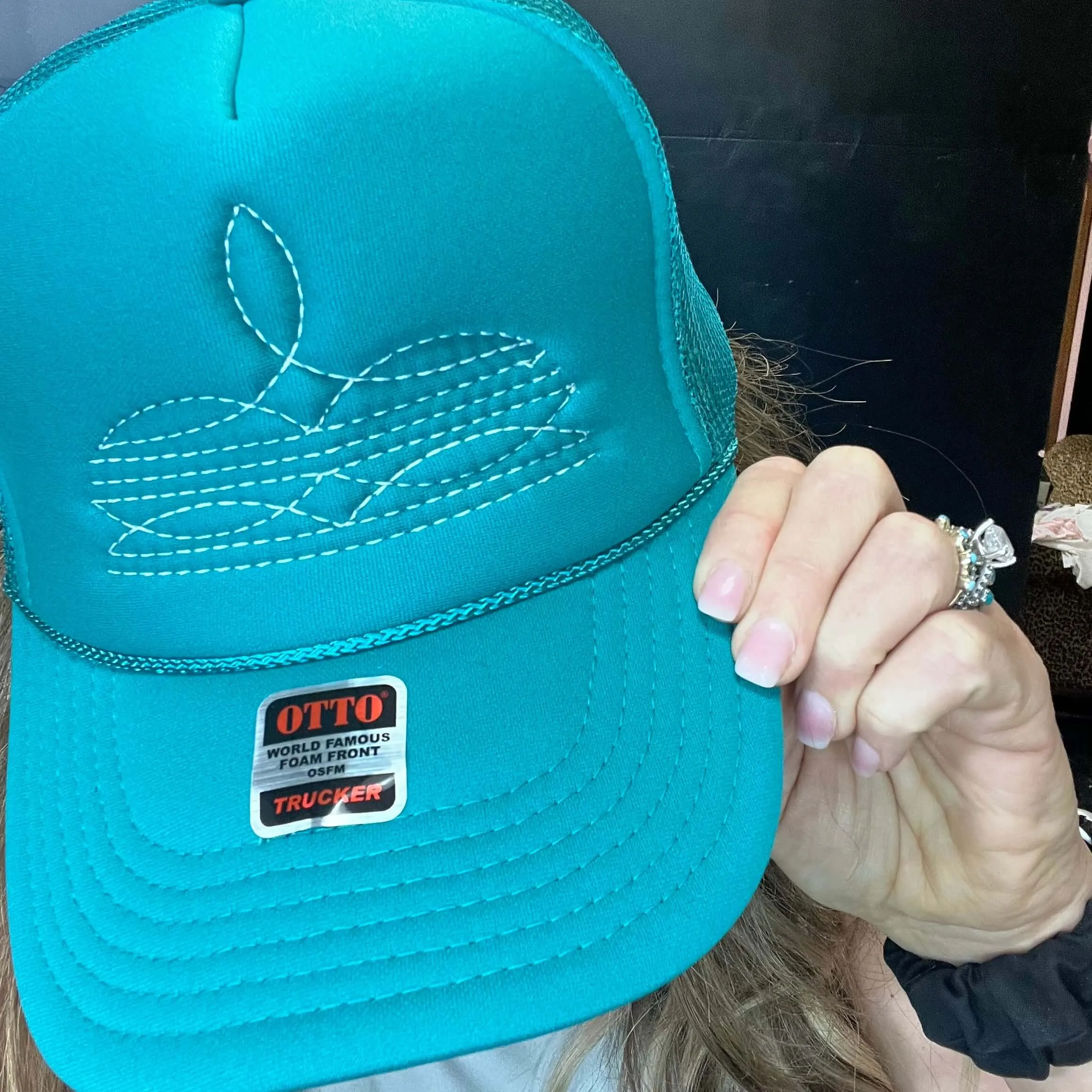 White on Turquoise Boot Stitch Trucker Cap